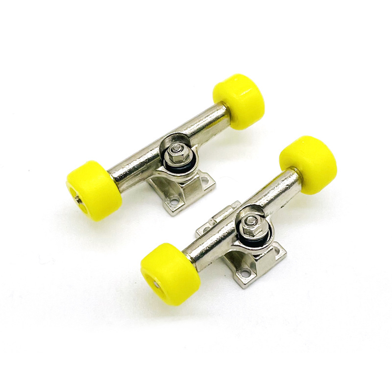 A pair of yellow wheels and a bridge
